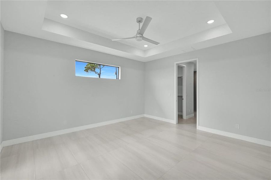 Spacious, unfurnished interior of a new home in , Port Charlotte (Image 26).