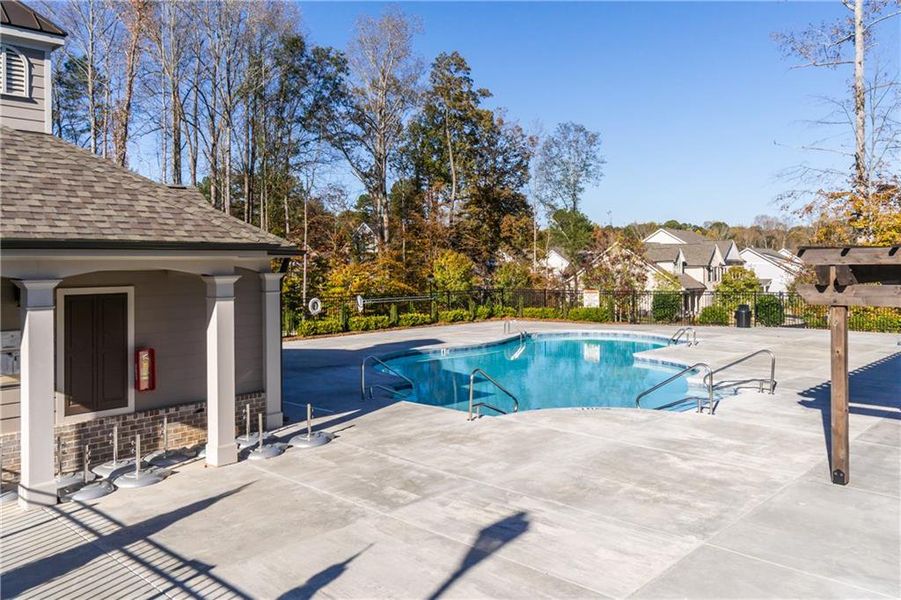 Exterior details and patio area of a home in Evanshire Single Family, Duluth (Image 22).