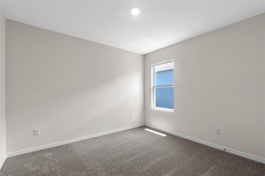 Spacious, unfurnished interior of a new home in Harmony at Lake Eloise, Winter Haven (Image 18).