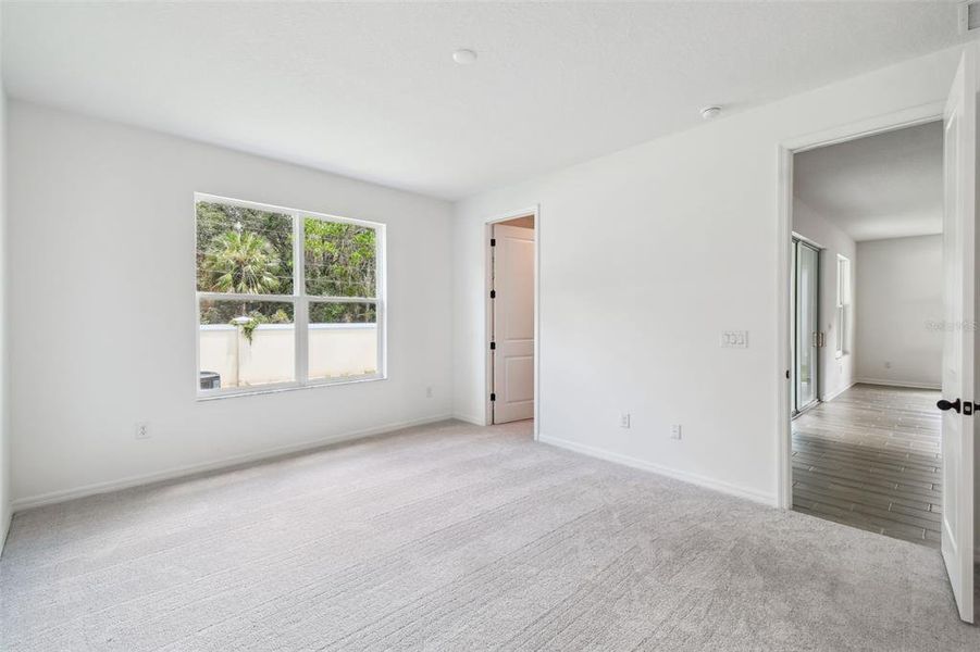Spacious, unfurnished interior of a new home in Cascades at Southern Hills, Brooksville (Image 37).