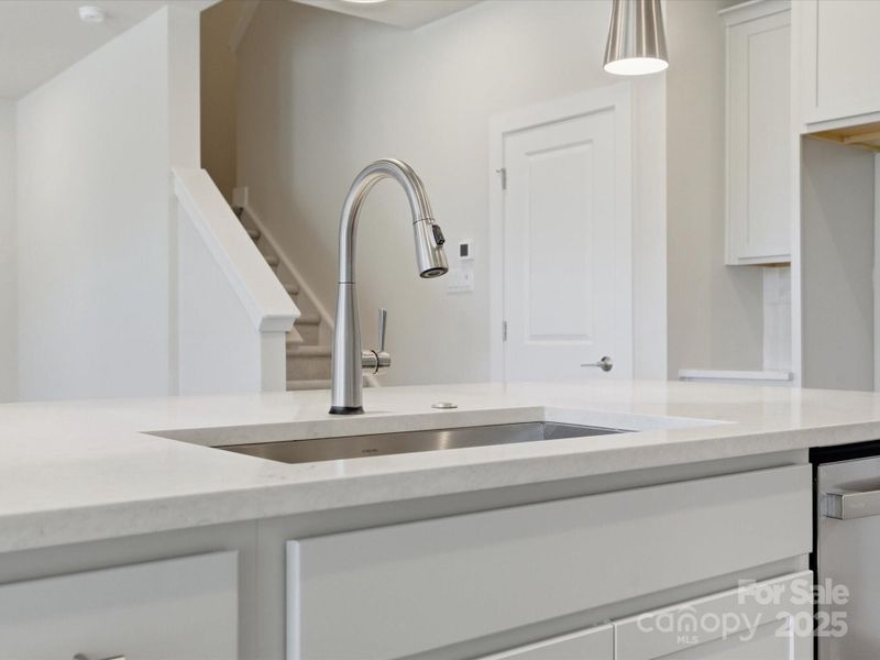 Stainless Single Basin Sink Paired with Stainless Touch Faucet.