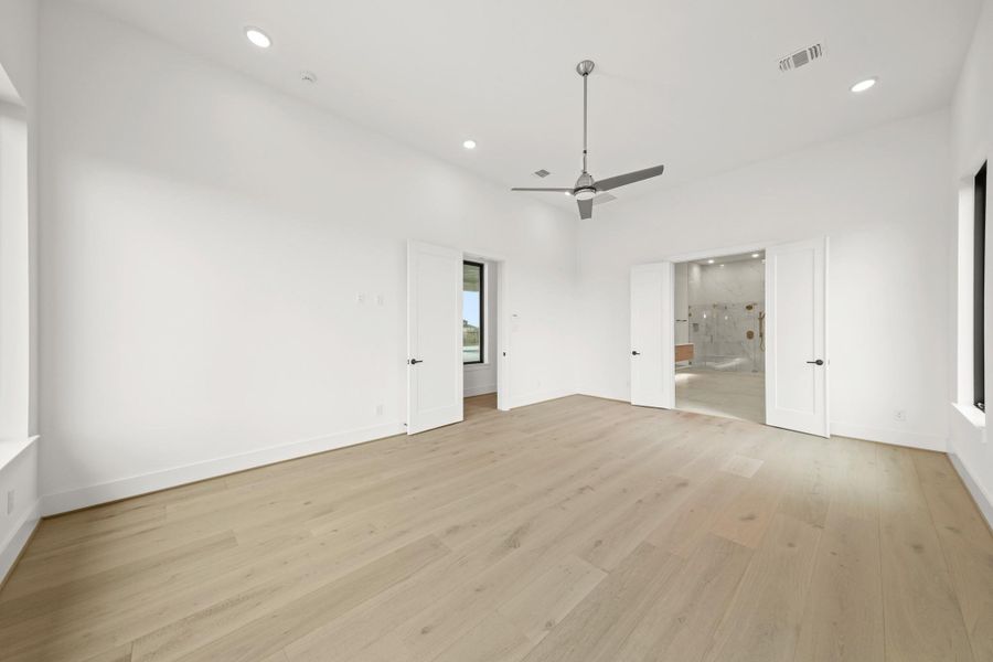 Spacious, unfurnished interior of a new home in Bridgeland, Cypress (Image 36).