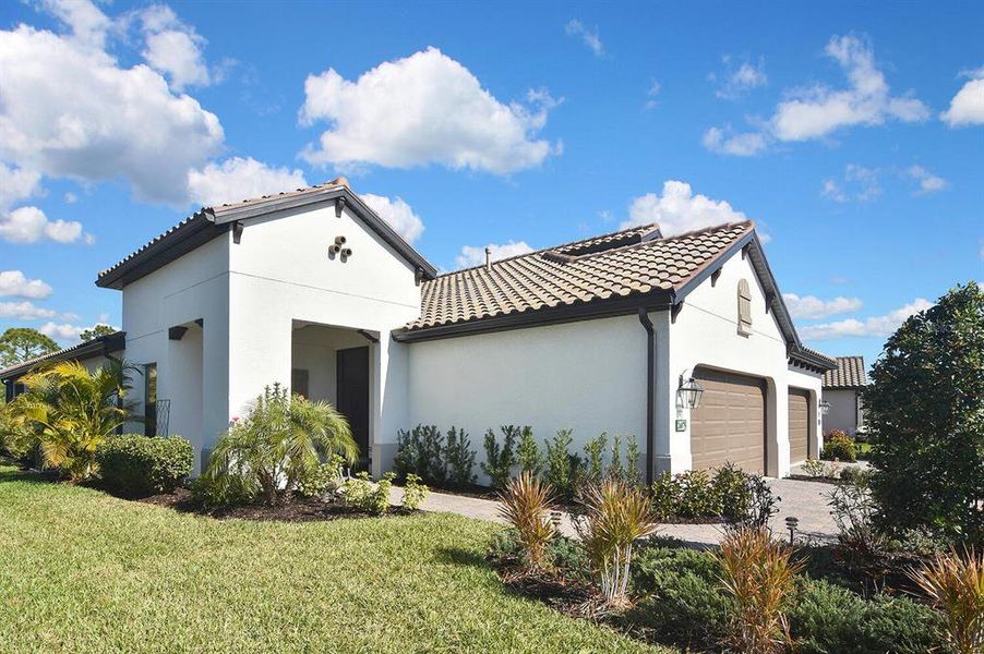 Front exterior of a new home in , Englewood, FL, highlighting curb appeal (Image 22).