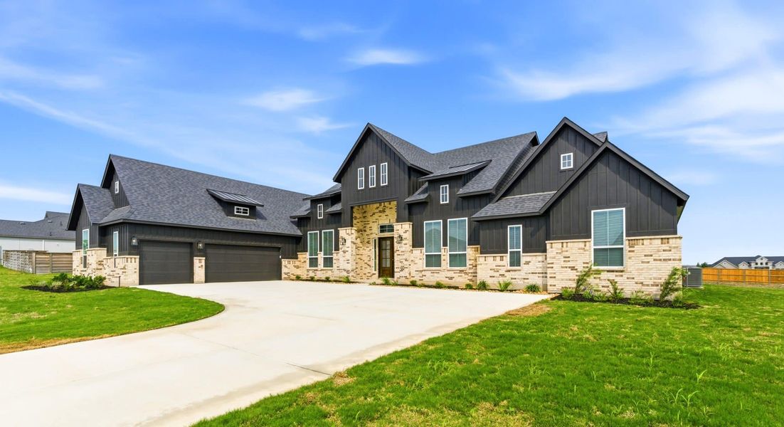 Front exterior of a new home in Regency Ranch, Marion, TX, highlighting curb appeal (Image 32).