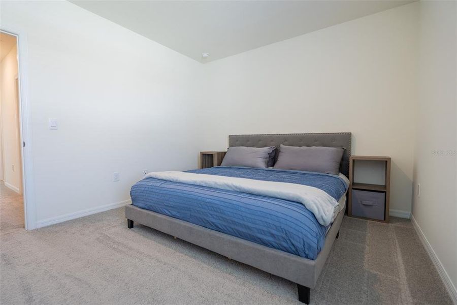 Furnished interior view inside a new home in Harmony at Lake Eloise, Winter Haven (Image 28).