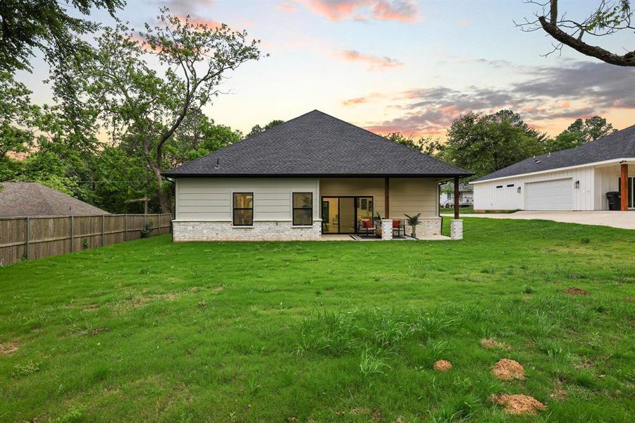 Exterior details and patio area of a home in , Denison (Image 4).