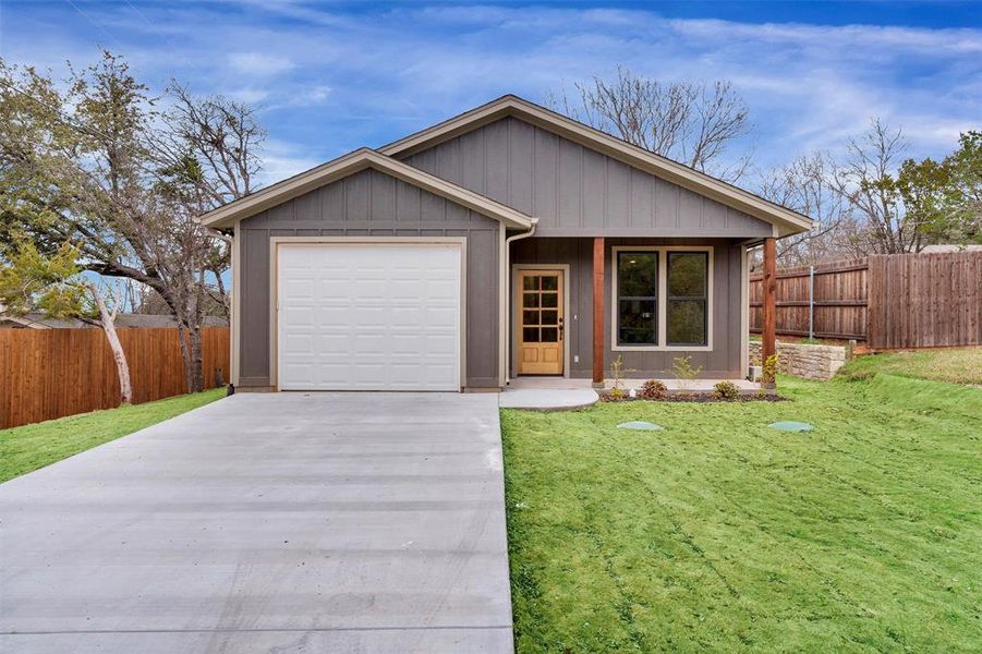 Front exterior of a new home in , Granbury, TX, highlighting curb appeal (Image 16).