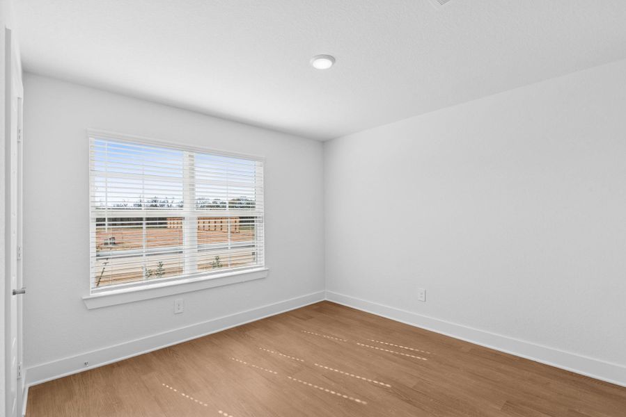 Spacious, unfurnished interior of a new home in Lone Star Landing, Montgomery (Image 12).