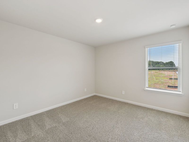 Spacious, unfurnished interior of a new home in Marshburn Landing - Bungalow Series, Wendell (Image 22).