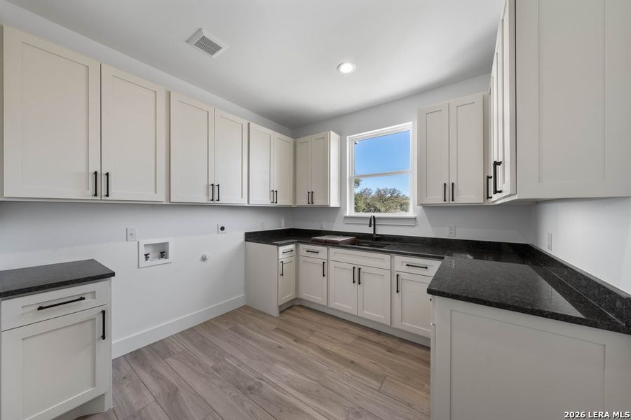 Furnished interior view inside a new home in , Bulverde (Image 47).