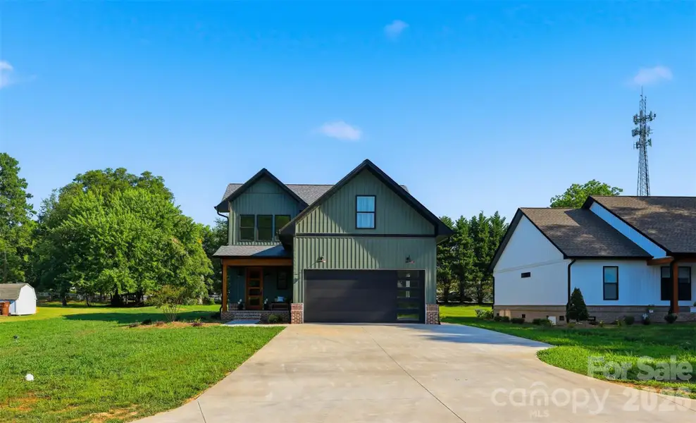 Front exterior of a new home in , Taylorsville, NC, highlighting curb appeal (Image 1). Front exterior of a new home in , Taylorsville, NC, highlighting curb appeal (Image 1).