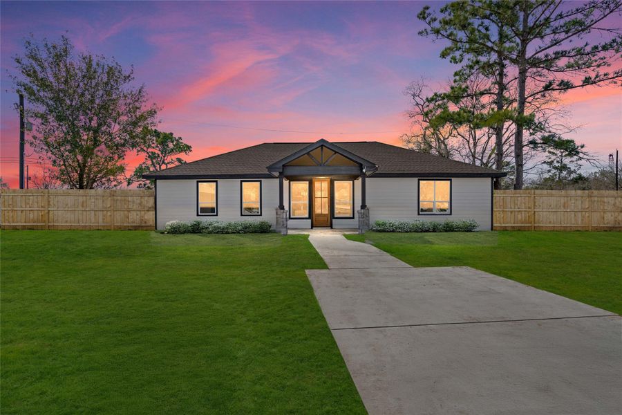 Welcome to 4654 N TeagueStreet. Stunning newly builthome, highlighting itsmodern façade andexpansive lawn. welcomingpathway leads to a strikingfront entry, promisingelegance and comfort fromthe moment you arrive.