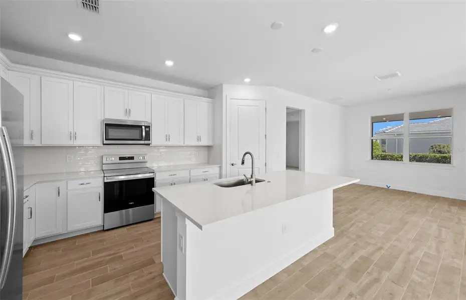 Furnished interior view inside a new home in Legacy Groves, Nokomis (Image 5).