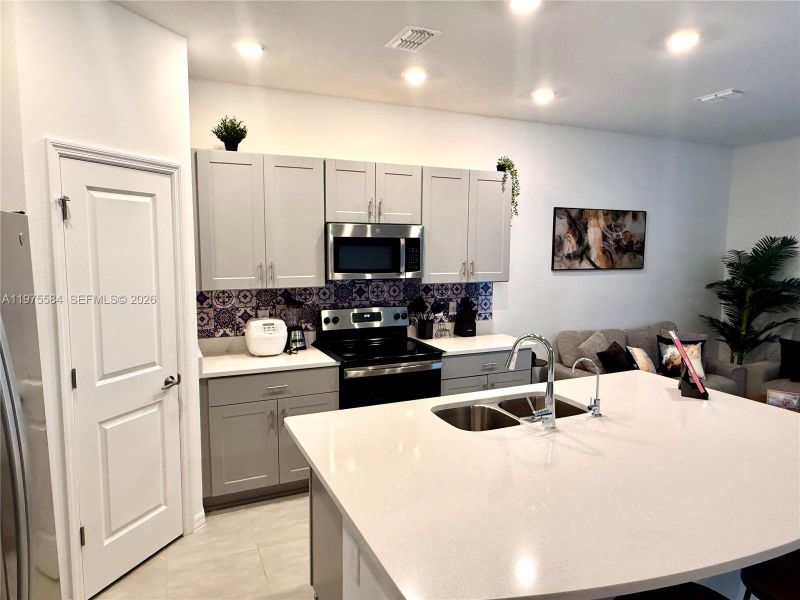 Furnished interior view inside a new home in , Kissimmee (Image 6).