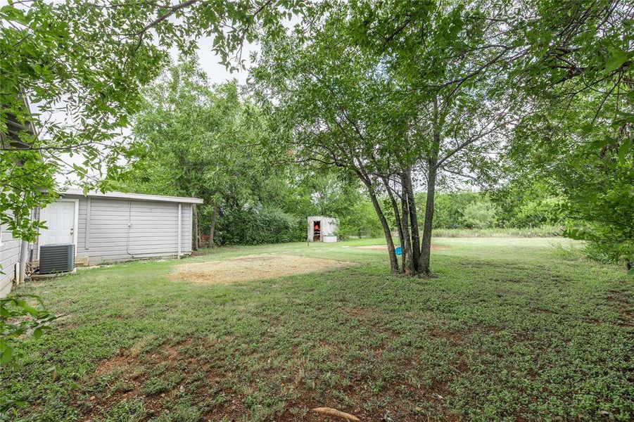 Exterior details and patio area of a home in , Early (Image 18). Exterior details and patio area of a home in , Early (Image 18).