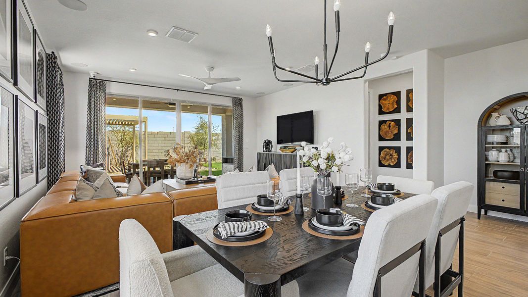 Bright, open dining area and great room in this quick move-in new home by DRB Homes at Saguaro Hills at Vistancia. Bright, open dining area and great room in this quick move-in new home by DRB Homes at Saguaro Hills at Vistancia.