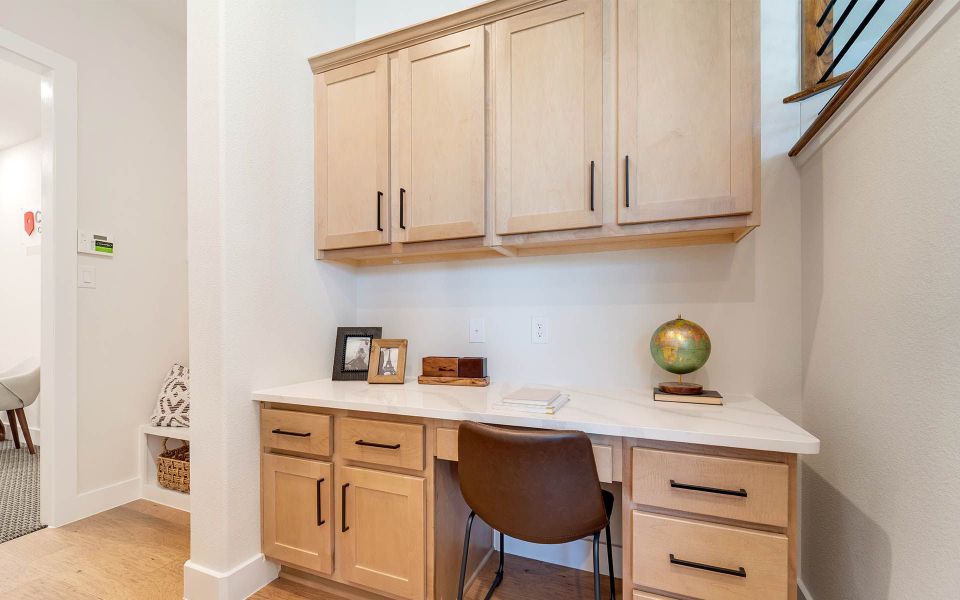 Representative furnished interior of a home built from the Rainier by CastleRock Communities in The Summit at Center Stage, Keller (Image 17).