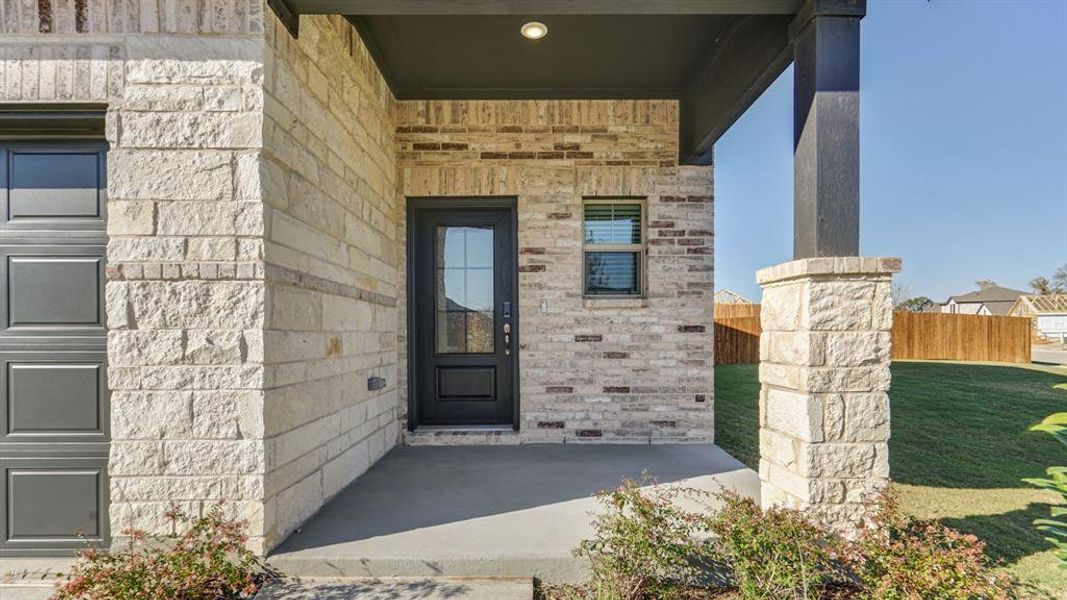 Exterior details and patio area of a home in Eastridge - Spring Series, McKinney (Image 2). Exterior details and patio area of a home in Eastridge - Spring Series, McKinney (Image 2).