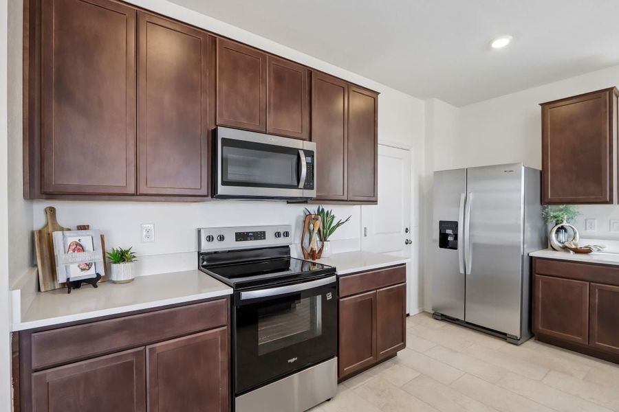 Furnished interior view inside a new home in Skyline Village Enclaves, San Tan Valley (Image 6).