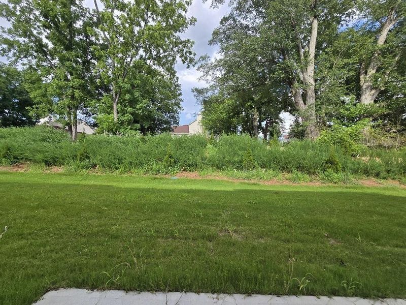 Exterior details and patio area of a home in Morning Creek Forest, South Fulton (Image 2).