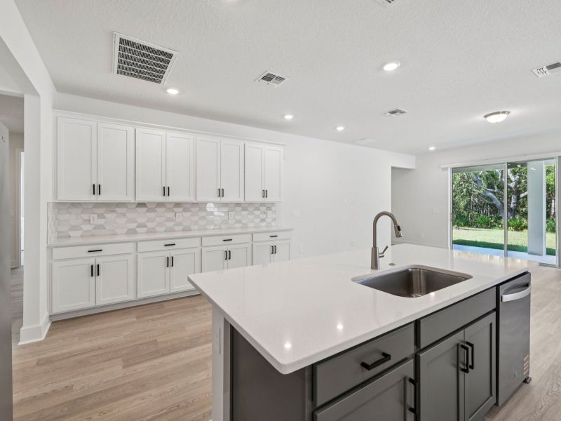 Furnished interior view inside a new home in Ridgehaven - Signature Series, Ormond Beach (Image 3).