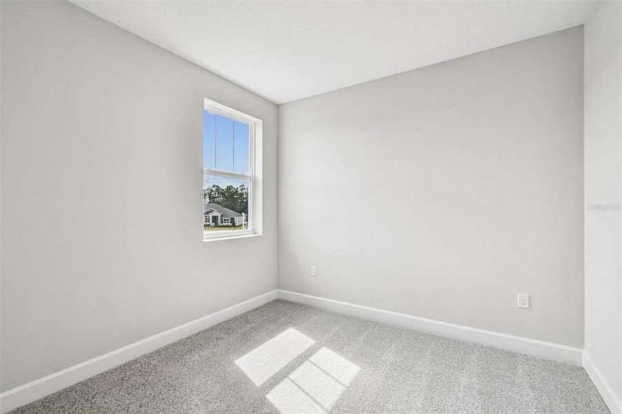 Spacious, unfurnished interior of a new home in Solace at Corner Lake, Orlando (Image 53).