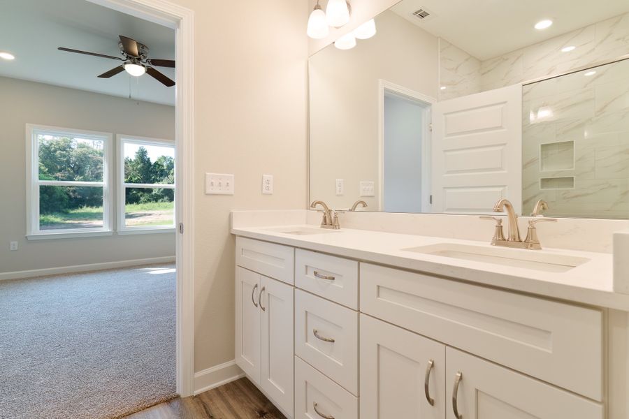 Representative furnished interior of a home built from the Maybell III by CJL Homes in McCarthy Estates, Defuniak Springs (Image 6).