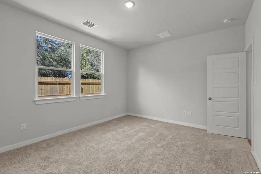Spacious, unfurnished interior of a new home in Senna, Leon Valley (Image 13).