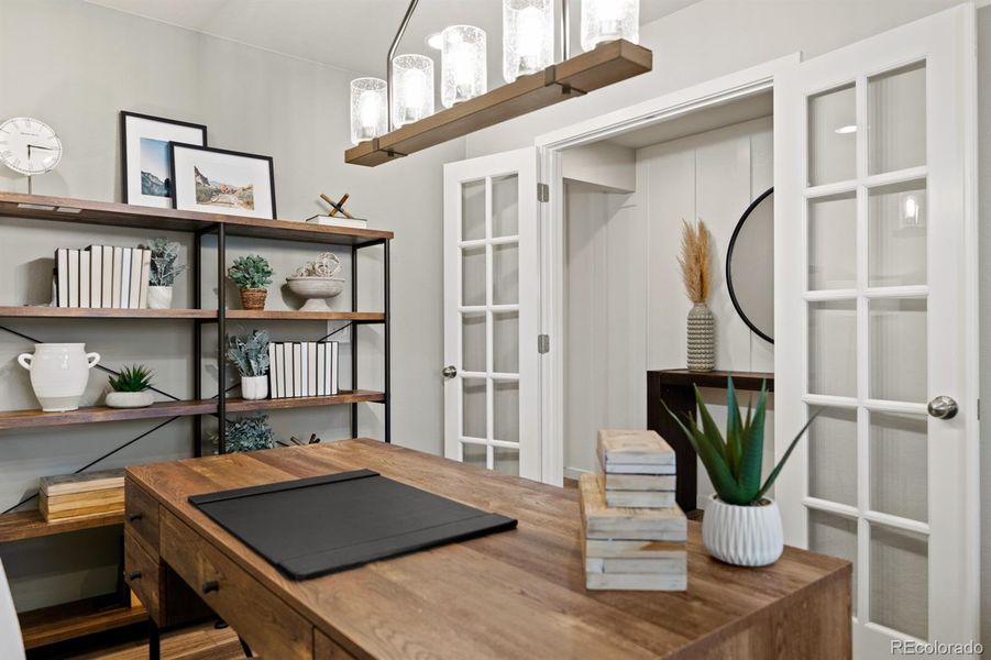 Photos shown are of a previously built model home and are intended to represent the floor plan. The home currently available may include different finishes, features, and selections.