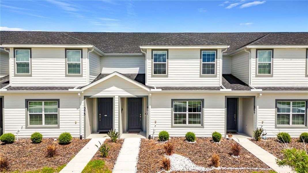 Front exterior of a new home in , St. Cloud, FL, highlighting curb appeal (Image 1). Front exterior of a new home in , St. Cloud, FL, highlighting curb appeal (Image 1).