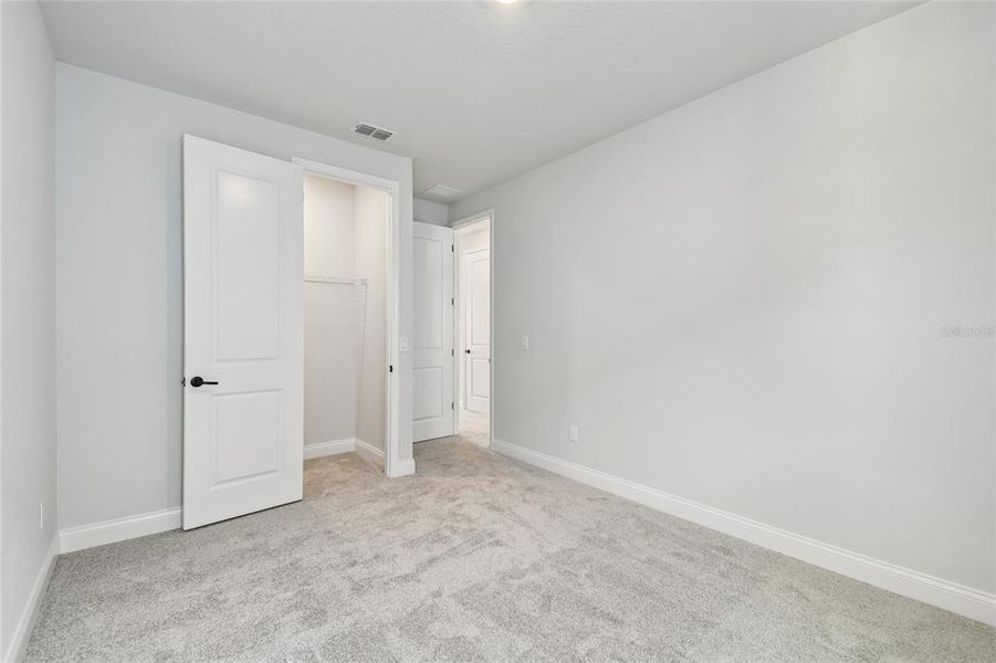 Spacious, unfurnished interior of a new home in Oakfield at Mount Dora Village Series, Mount Dora (Image 31).