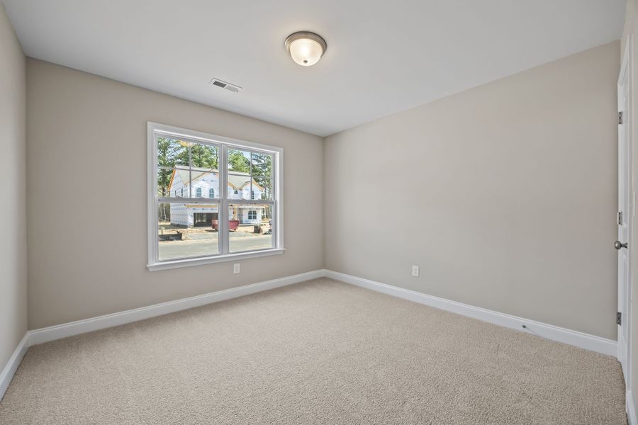 Spacious, unfurnished interior of a new home in Davenport Farms, Winterville (Image 34).