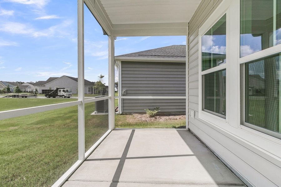 Front exterior of a new home in Horizons at Summers Corner | 55+: The Cottages, Summerville, SC, highlighting curb appeal (Image 1). Front exterior of a new home in Horizons at Summers Corner | 55+: The Cottages, Summerville, SC, highlighting curb appeal (Image 1).