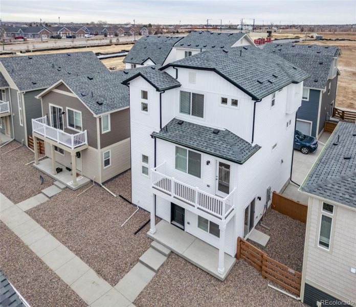Front exterior of a new home in Muegge Farms, Bennett, CO, highlighting curb appeal (Image 24).