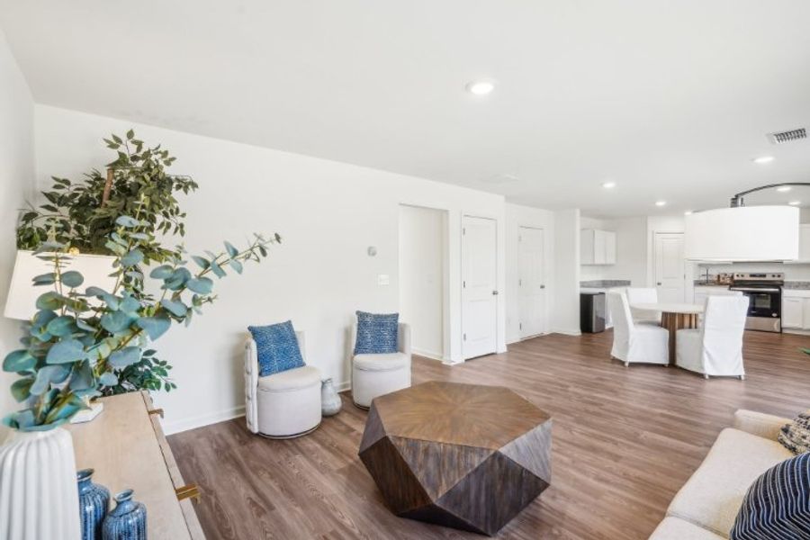 A living room with white walls. A living room with white walls.