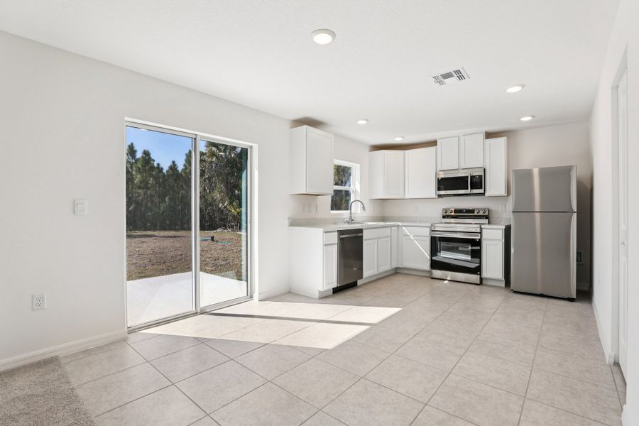 Furnished interior view inside a new home in Vero Lake Estates, Vero Beach (Image 5).