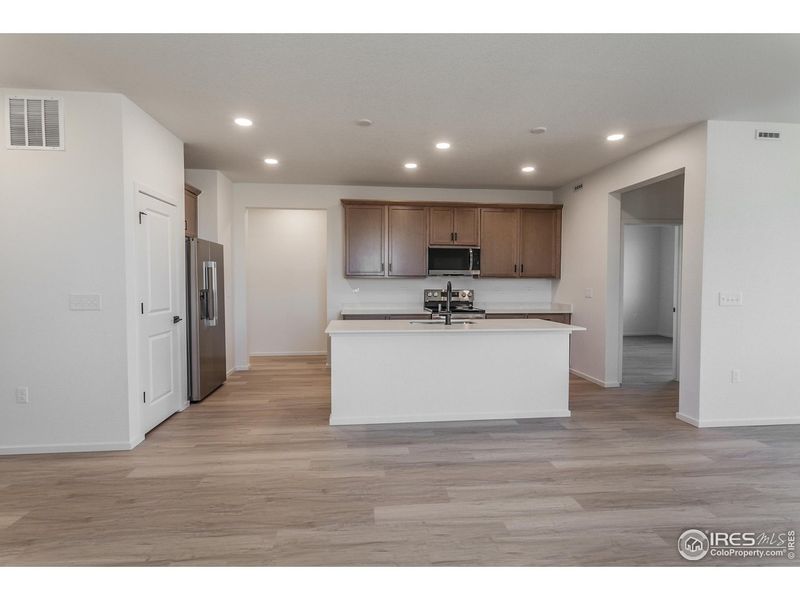 Furnished interior view inside a new home in Bloom Trailblazer Collection - Single Family Homes, Fort Collins (Image 15).