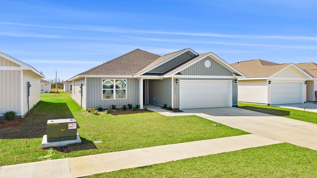 Front exterior of a new home in Liberty, Panama City, FL, highlighting curb appeal (Image 23).