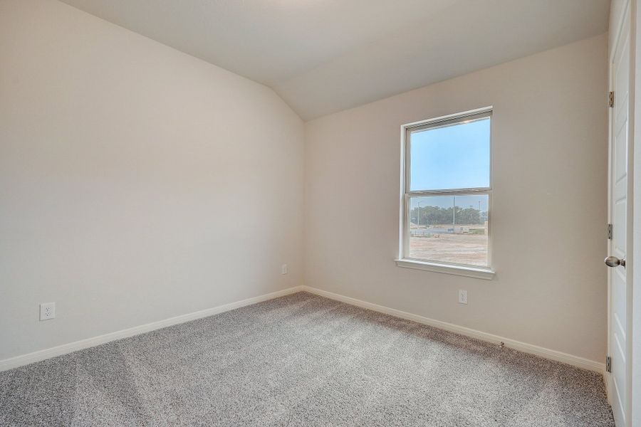 Guest room in the Oleander floorplan at a Meritage Homes community.