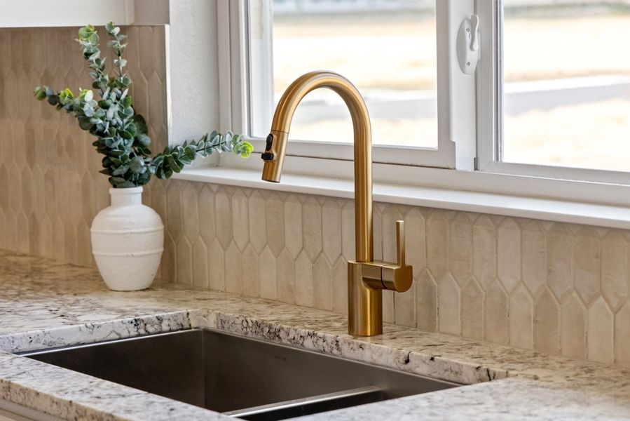 Brushed gold kitchen faucet