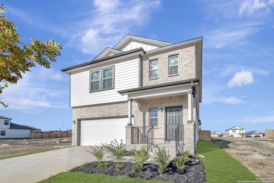 Front exterior of a new home in Park Place, New Braunfels, TX, highlighting curb appeal (Image 24). Front exterior of a new home in Park Place, New Braunfels, TX, highlighting curb appeal (Image 24).