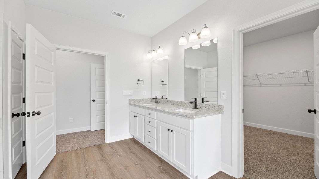 Representative furnished interior of a home built from the The Jasmine by D.R. Horton in Meadows at Rehwinkel, Crawfordville (Image 24).