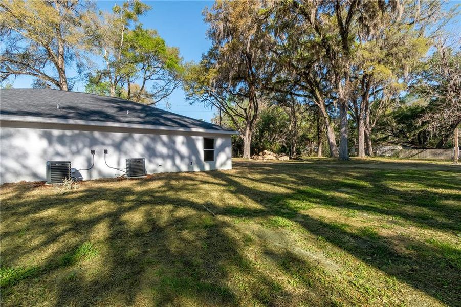 Exterior details and patio area of a home in , Williston (Image 3).