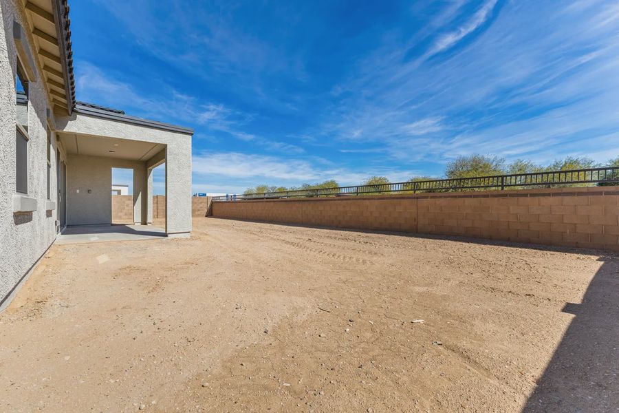 Exterior details and patio area of a home in Valencia at Granite Vista, Waddell (Image 18).