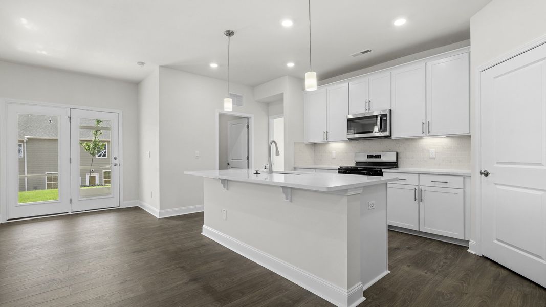 Furnished interior view inside a new home in The Villas at Kinsley, Jamestown (Image 6).