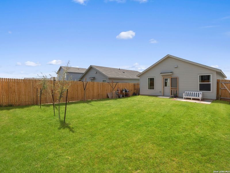 Exterior details and patio area of a home in Rose Valley, Converse (Image 29).