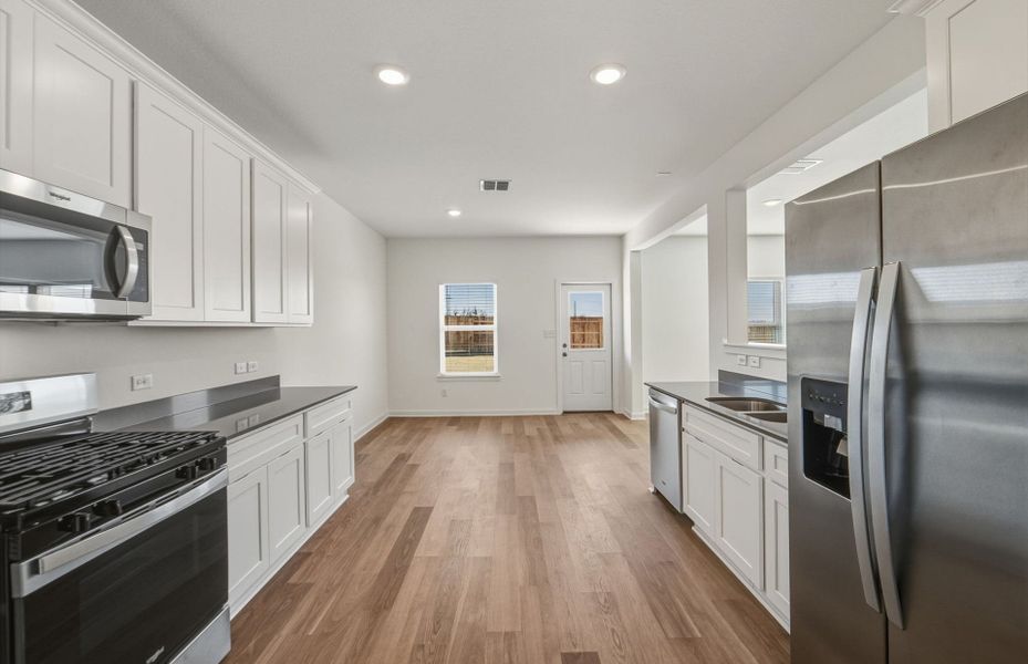 Furnished interior view inside a new home in Sunfield, Buda (Image 10).