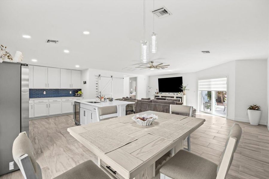 Dining Area Overlooking the Gourmet Kitchen and Breakfast Bar