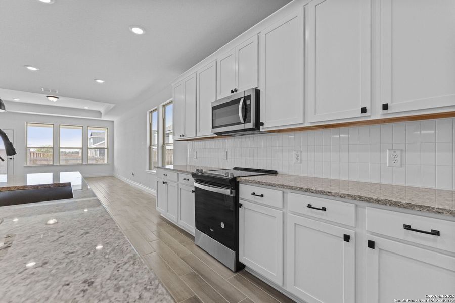 Furnished interior view inside a new home in Lily Springs, Seguin (Image 5).