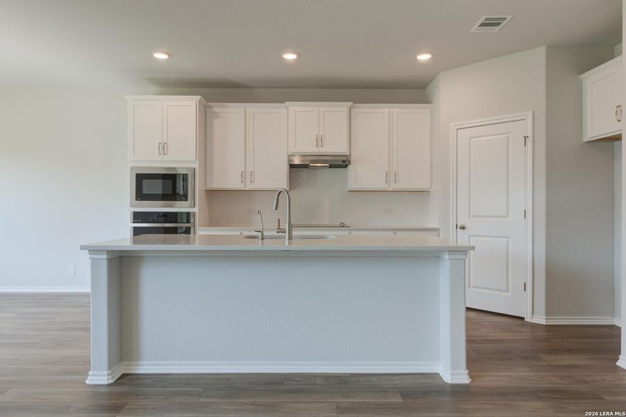 Furnished interior view inside a new home in Nopal Valley, San Antonio (Image 7).
